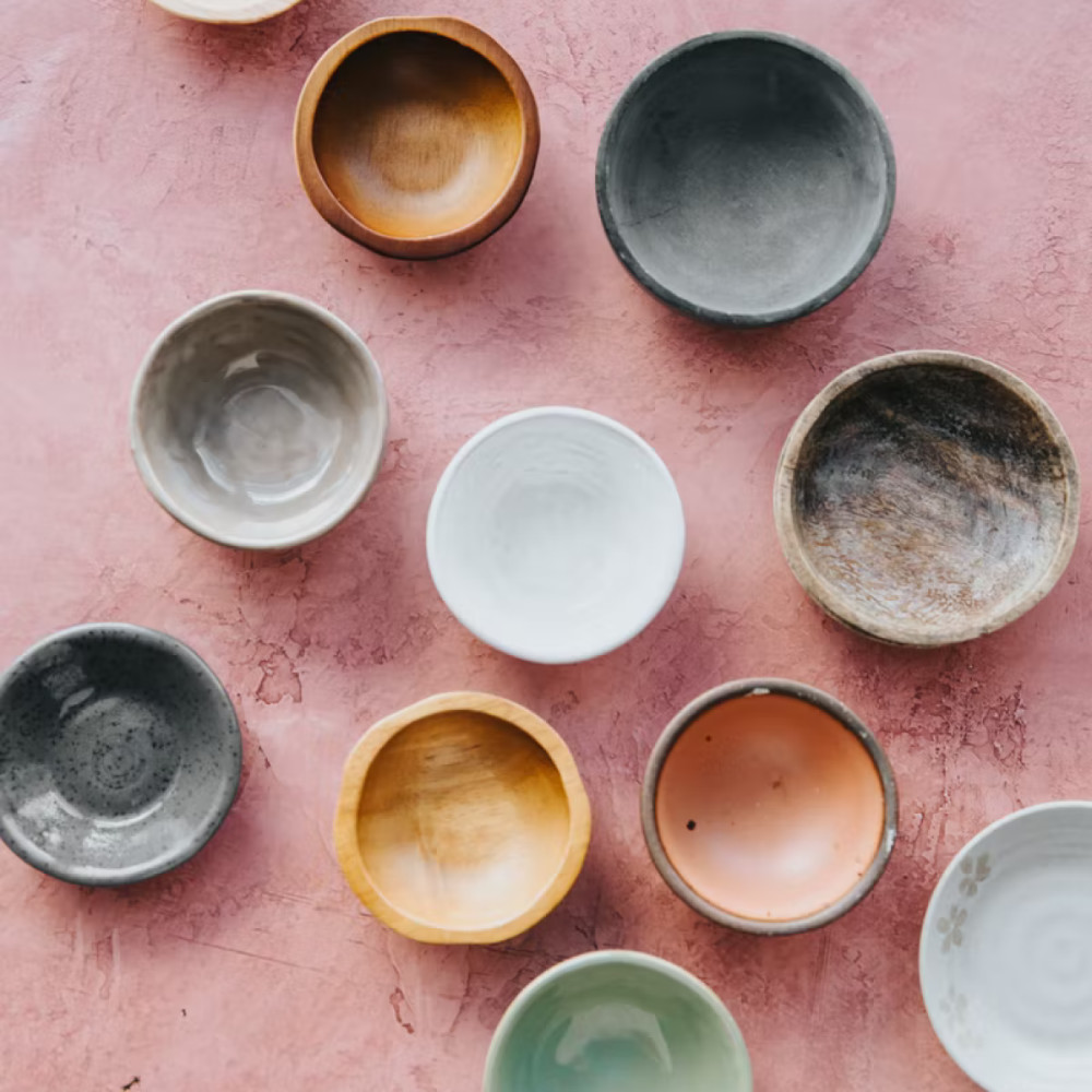 Handmade pottery bowls of various colours