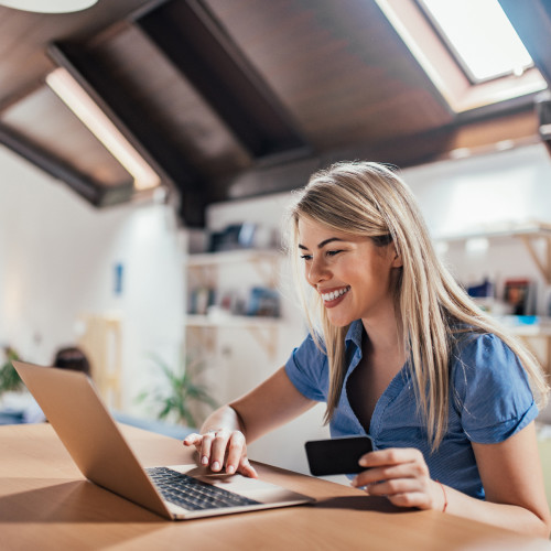 Female professional using instalment payments to order online